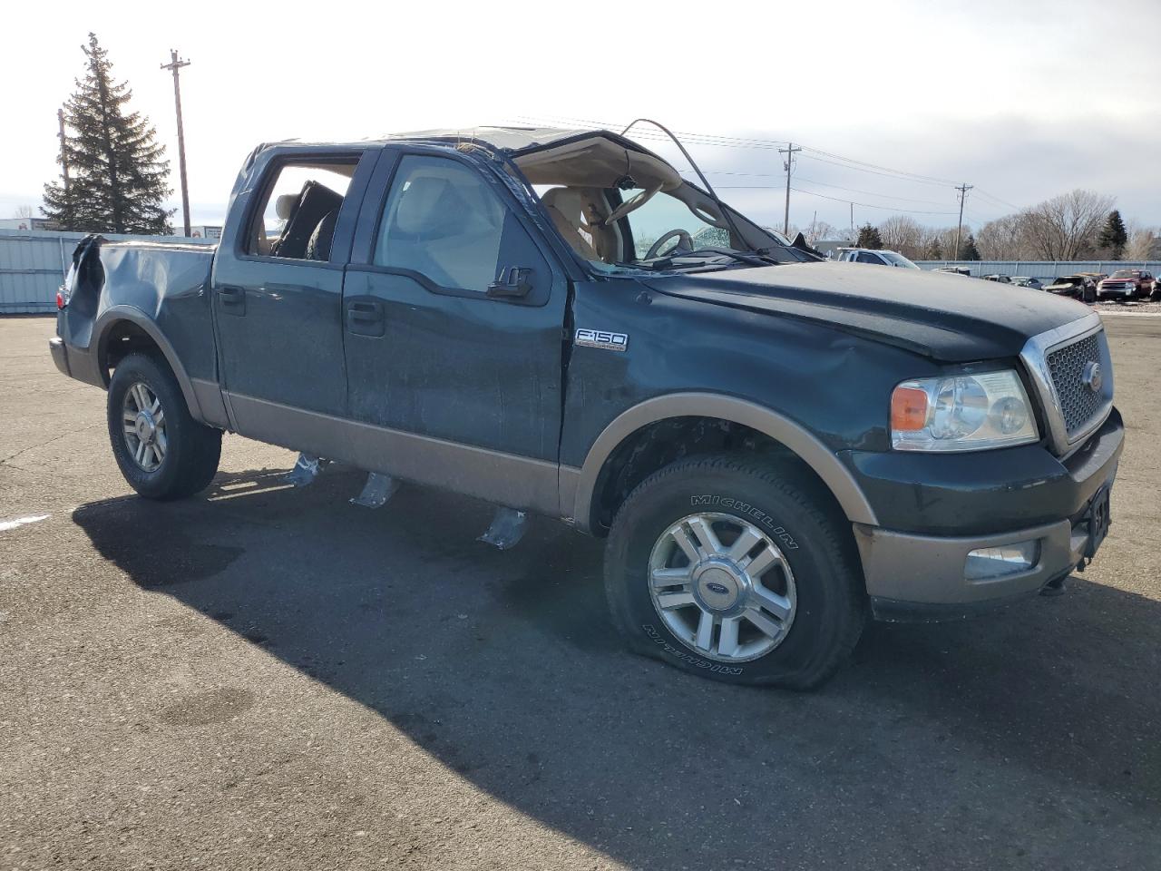 2004 Ford F-150 VIN 1FTPW14574KD12965 Copart auction photo, rollover damage thumbnail 4