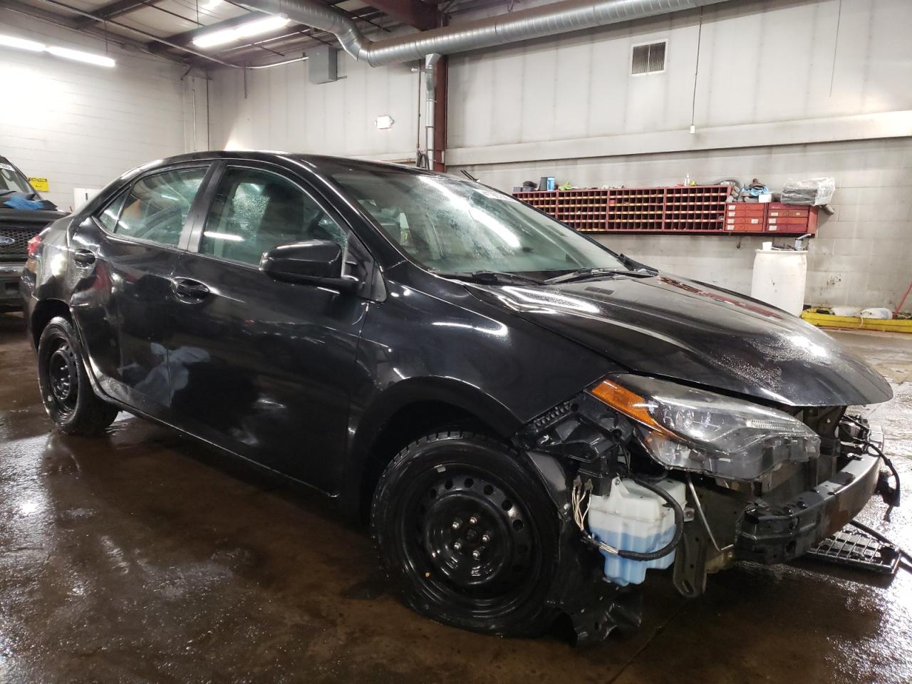 2017 Toyota Corolla VIN 5YFBURHE4HP667799 Copart auction photo, front end / side damage thumbnail 4