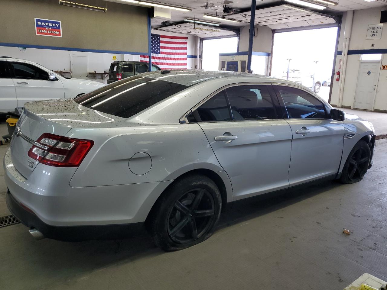 2013 Ford Taurus VIN 1FAHP2H83DG215475 Copart auction photo, front end / side damage thumbnail 3