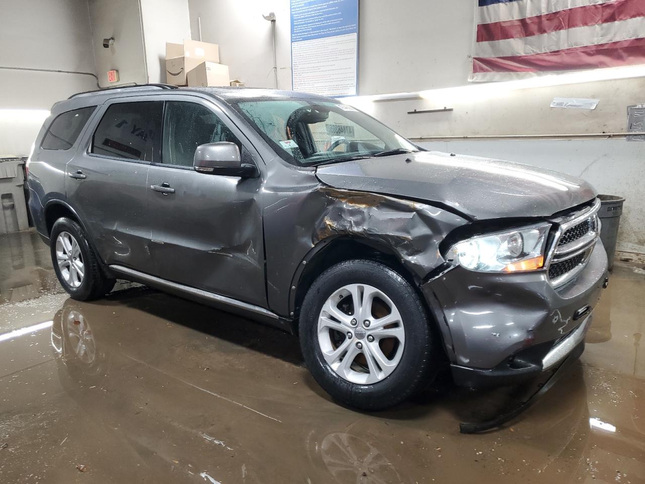 2012 Dodge Durango VIN 1C4RDJDG1CC100717 Copart auction photo, front end / side damage thumbnail 4