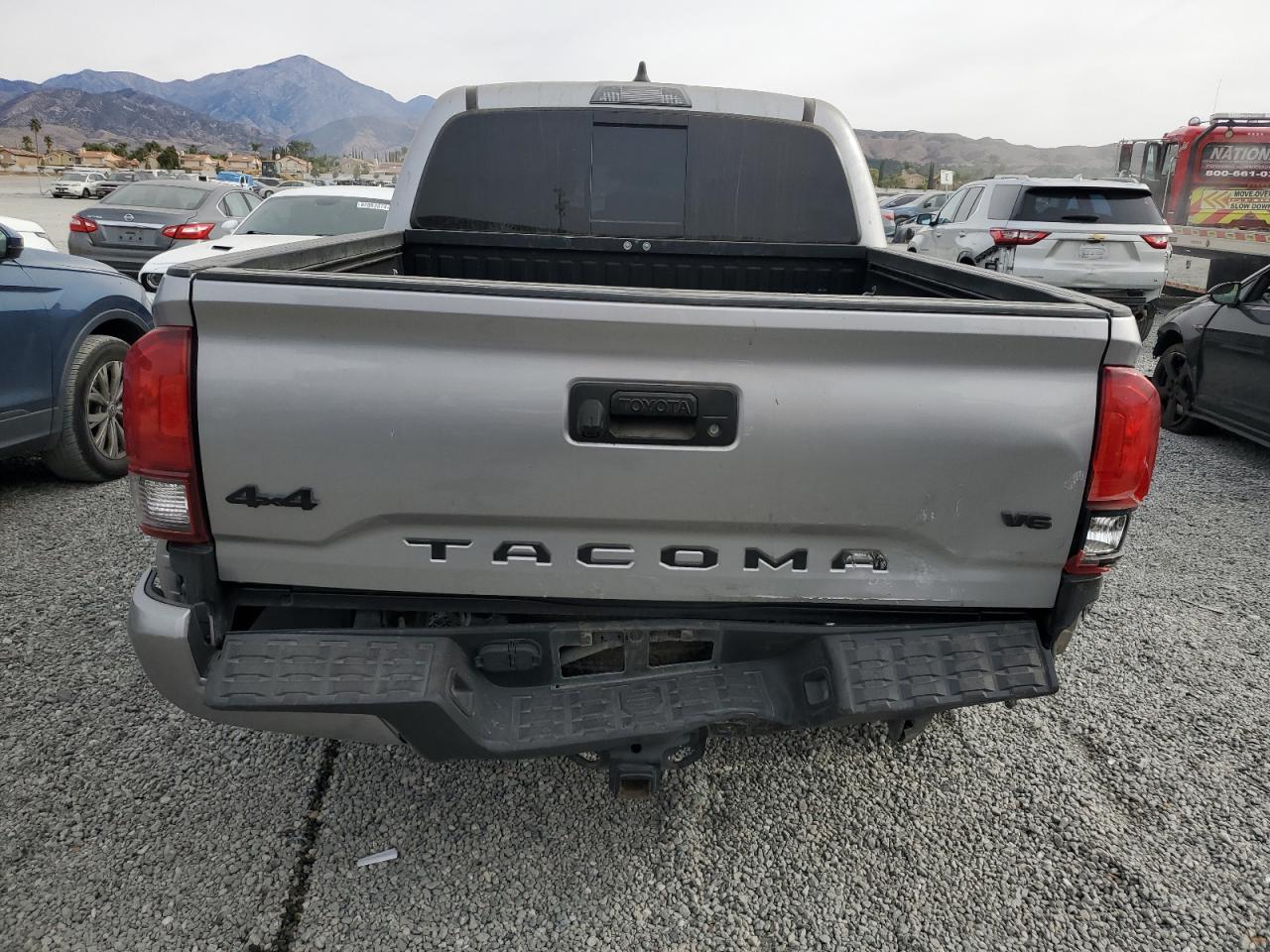 2021 Toyota Tacoma VIN 5TFCZ5AN0MX282776 Copart auction photo, rear end damage thumbnail 6