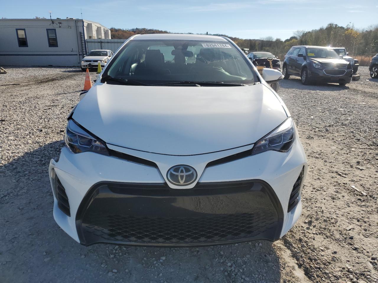 2018 Toyota Corolla VIN 5YFBURHE5JP810703 Copart auction photo, front end / side damage thumbnail 5