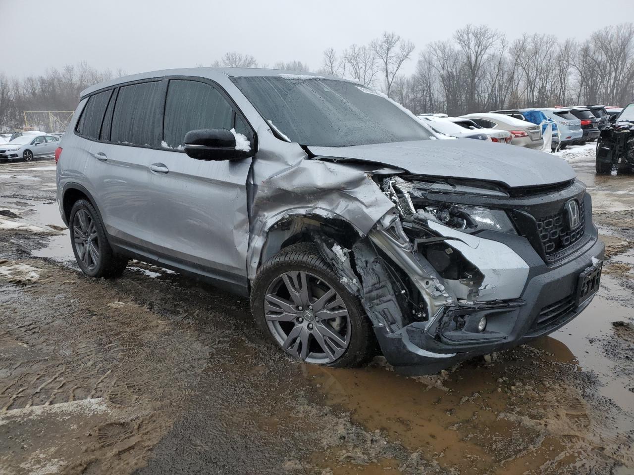 2021 Honda Passport VIN 5FNYF8H50MB033538 Copart auction photo, front end / side damage thumbnail 4