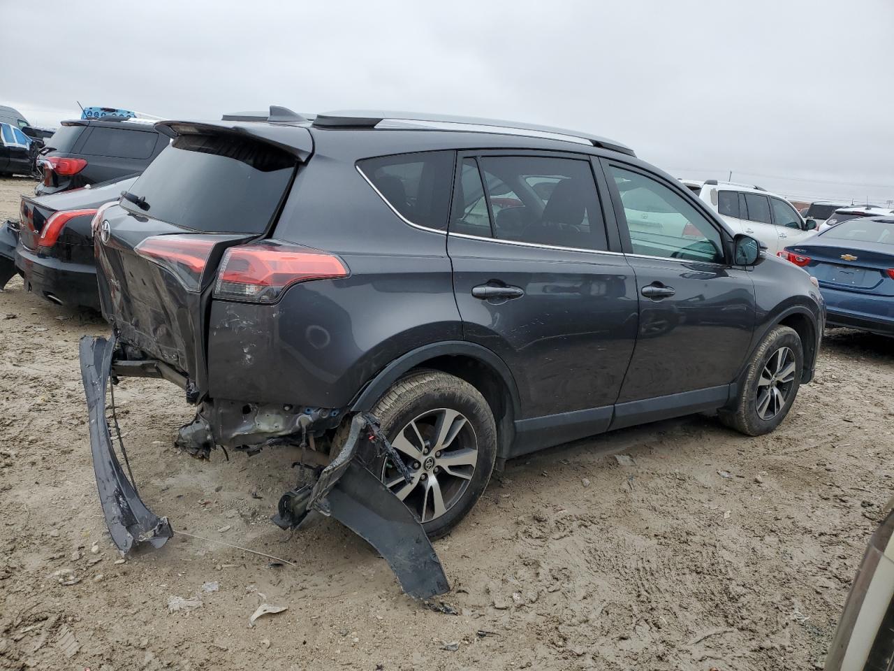 2018 Toyota RAV 4 VIN 2T3RFREV6JW851053 Copart auction photo, rear end damage thumbnail 3