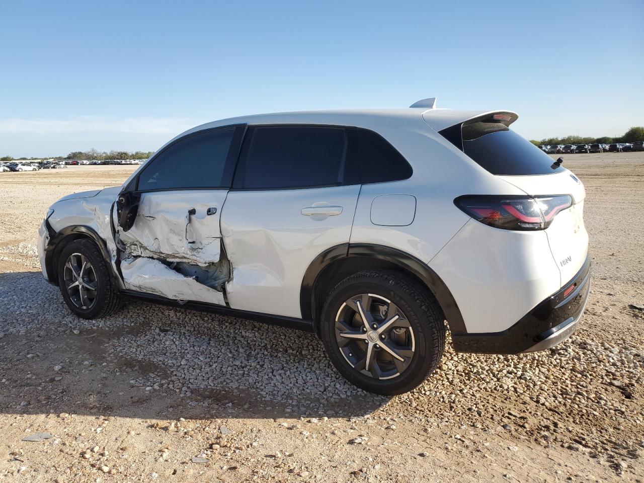 2023 Honda HR-V VIN 3CZRZ1H74PM700285 Copart auction photo, side / minor dent/scratches damage thumbnail 2