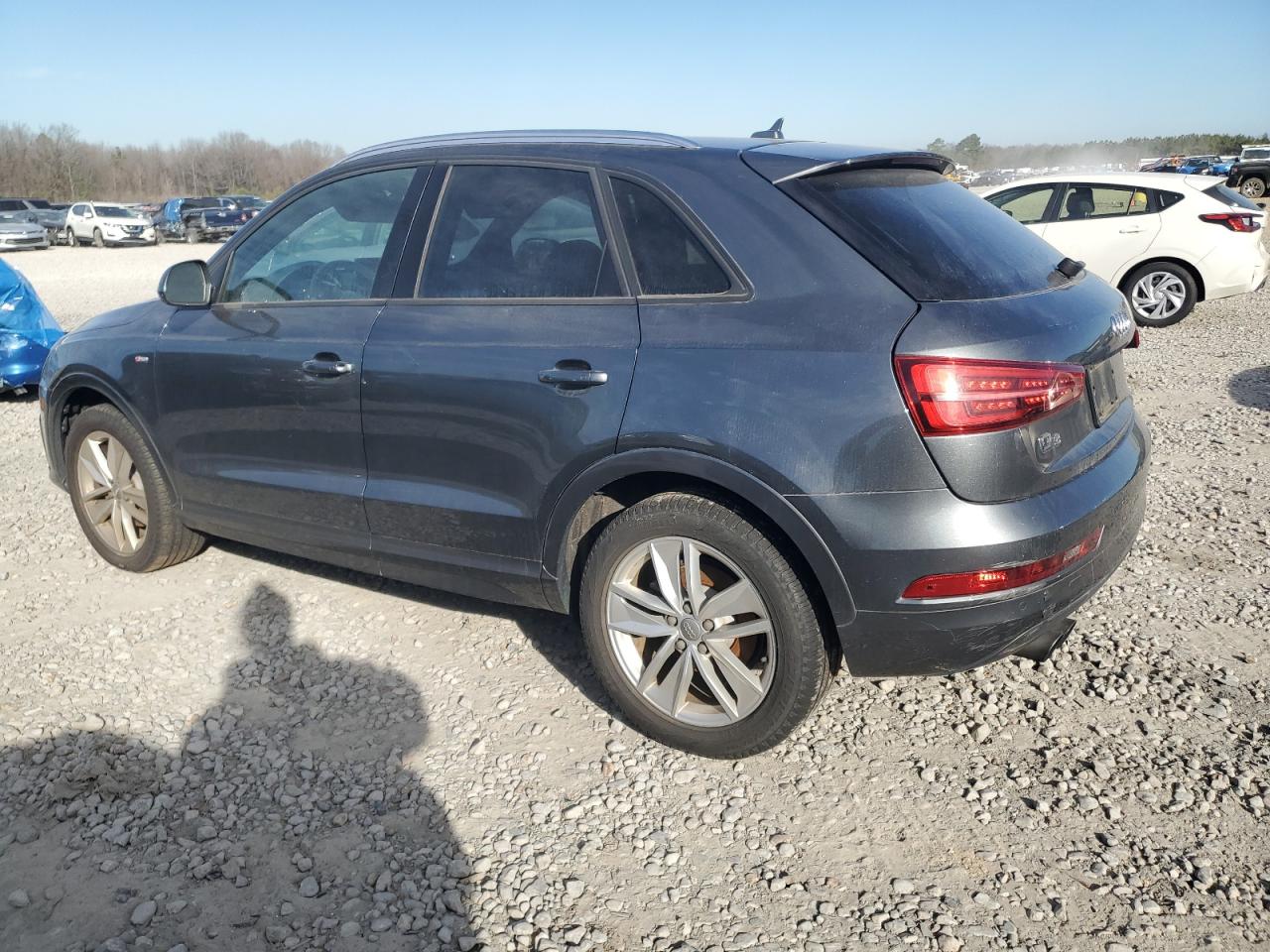 2018 Audi Q3 VIN WA1BCCFS1JR000879 Copart auction photo, vandalism damage thumbnail 2