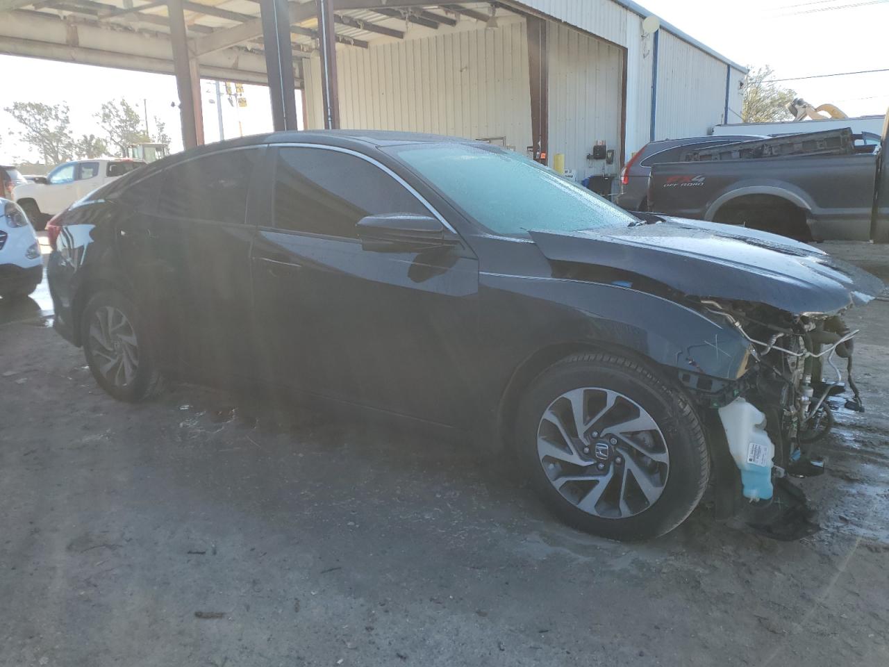 2017 Honda Civic VIN 19XFC2F71HE212037 Copart auction photo, front end damage thumbnail 4