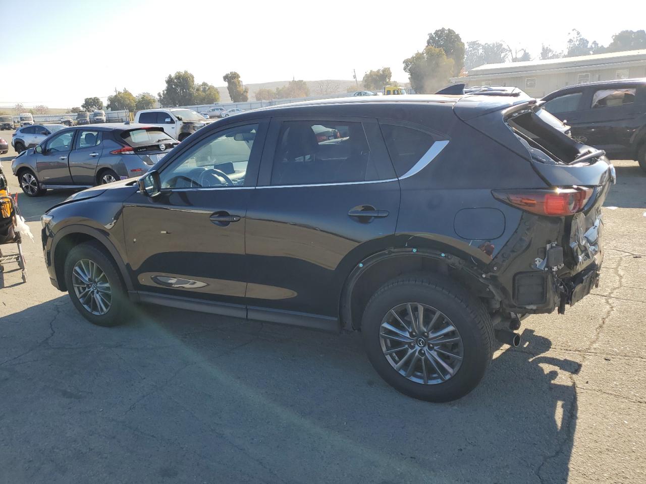 2017 Mazda CX-5 VIN JM3KFACLXH0158738 Copart auction photo, front end / rear end damage thumbnail 2