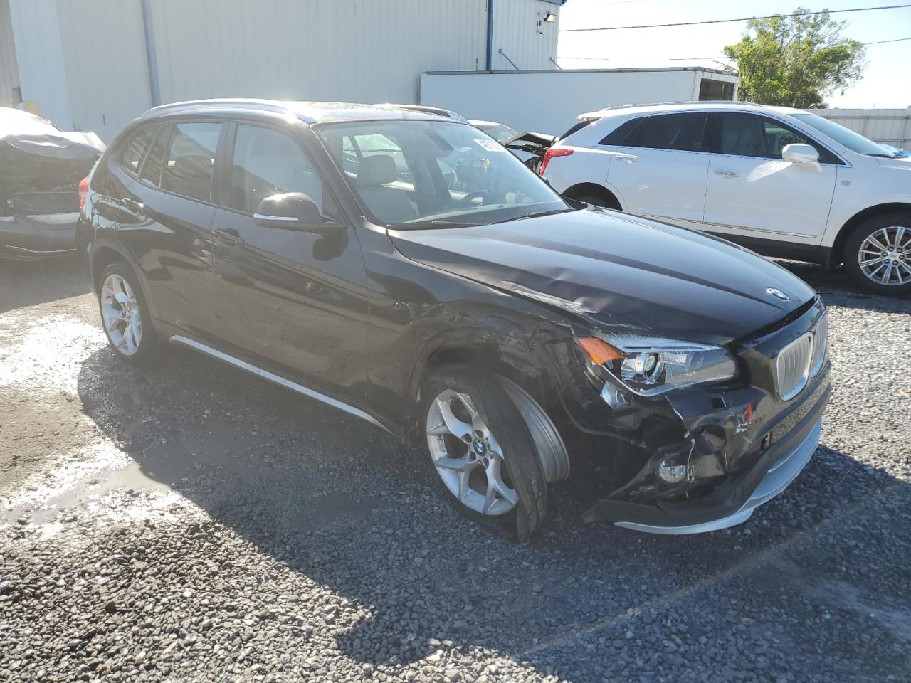 2015 BMW X1 VIN WBAVL1C54FVY32072 Copart auction photo, side / front end damage thumbnail 4