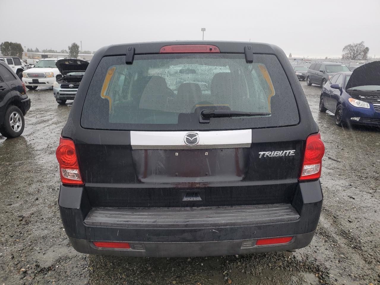 2011 Mazda Tribute VIN 4F2CY0C79BKM01536 Copart auction photo, side / minor dent/scratches damage thumbnail 6