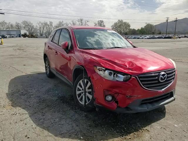 2016 Mazda CX-5 VIN JM3KE2CY9G0807478 Copart auction photo, side / front end damage thumbnail 11