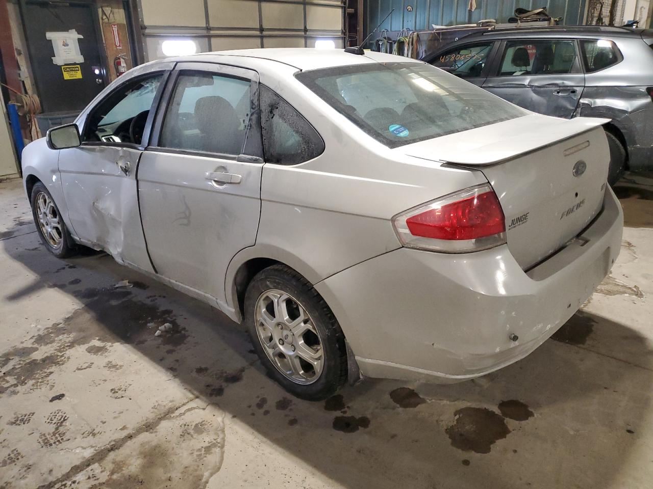 2009 Ford Focus VIN 1FAHP36N59W262468 Copart auction photo, side / minor dent/scratches damage thumbnail 2