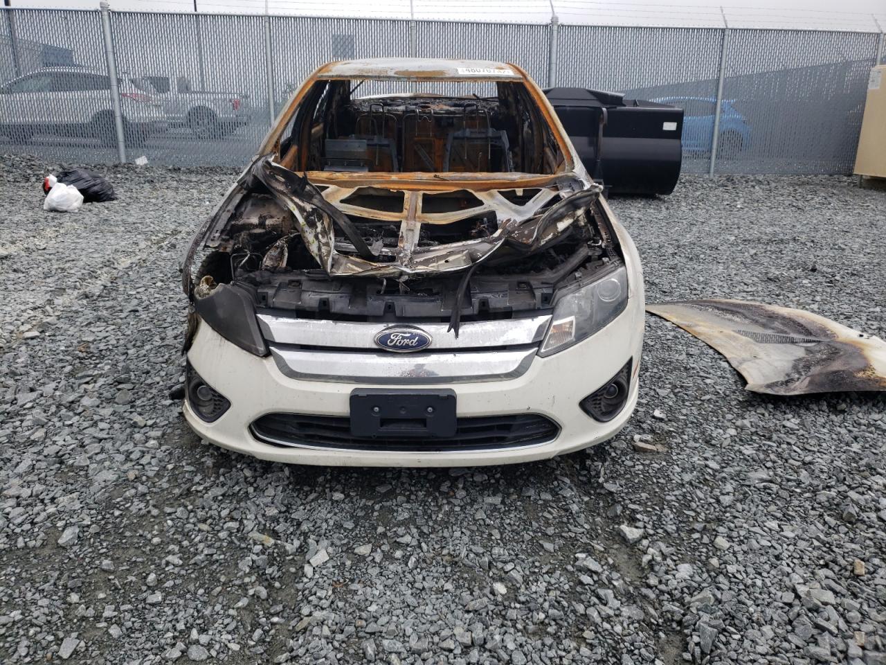 2011 Ford Fusion VIN 3FAHP0HA6BR240397 Copart auction photo, burn damage thumbnail 10