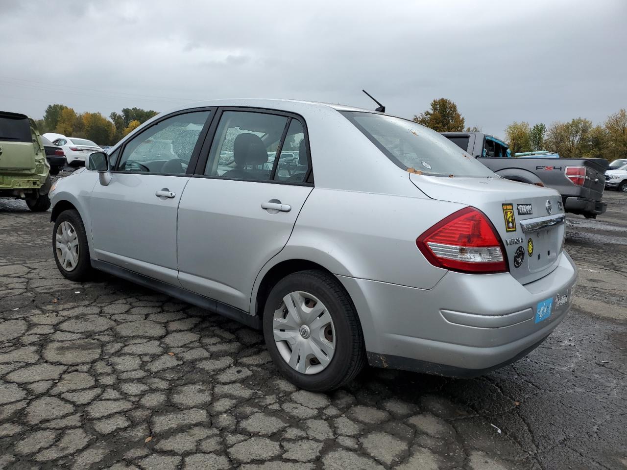 2011 Nissan Versa VIN 3N1BC1AP5BL477405 Copart auction photo, front end damage thumbnail 2