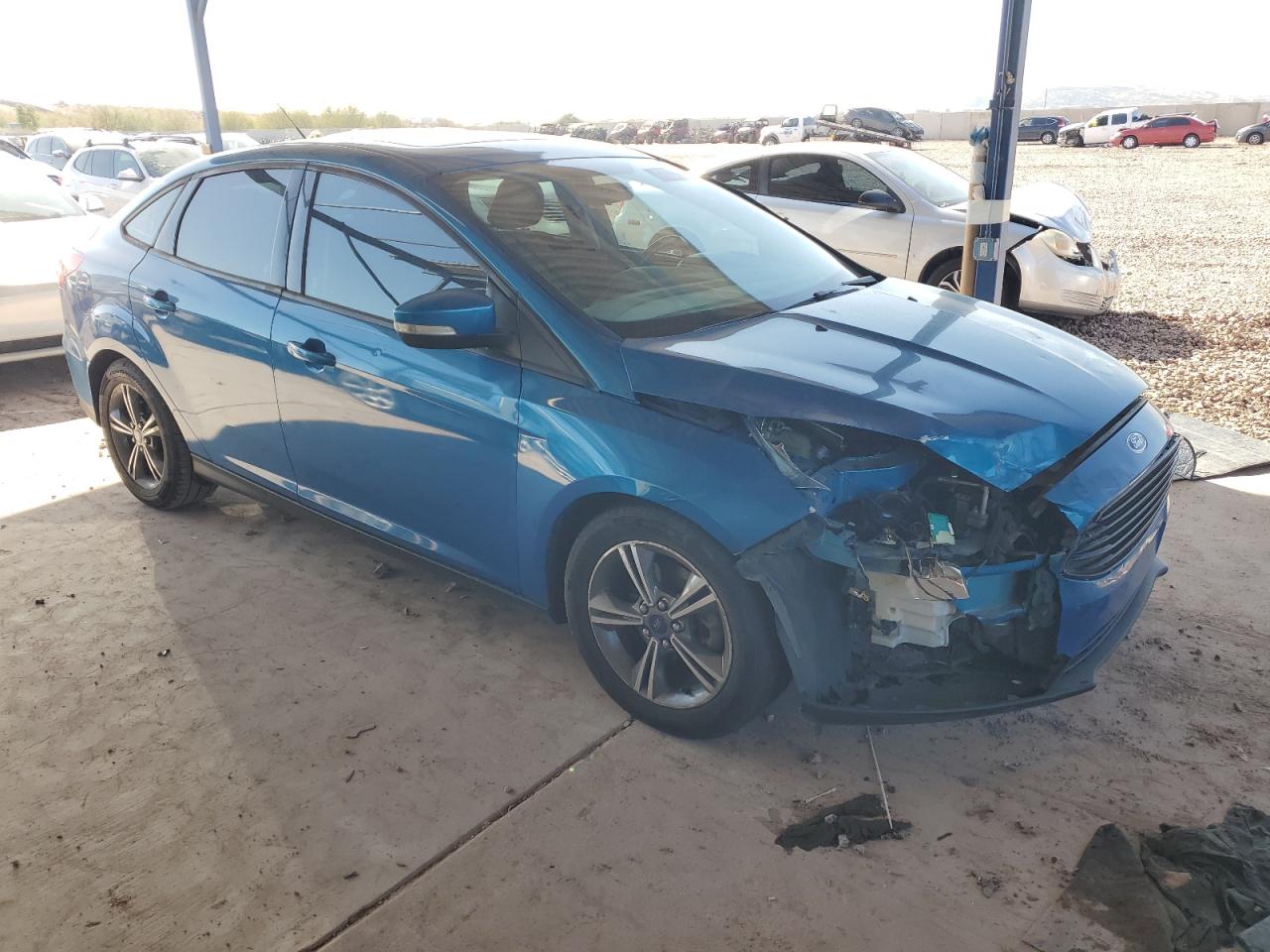 2016 Ford Focus VIN 1FADP3FE7GL238959 Copart auction photo, front end damage thumbnail 4