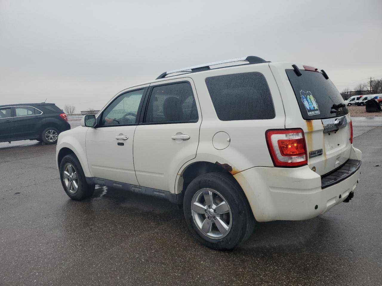 2010 Ford Escape VIN 1FMCU9EG8AKC95913 Copart auction photo, stripped damage thumbnail 2