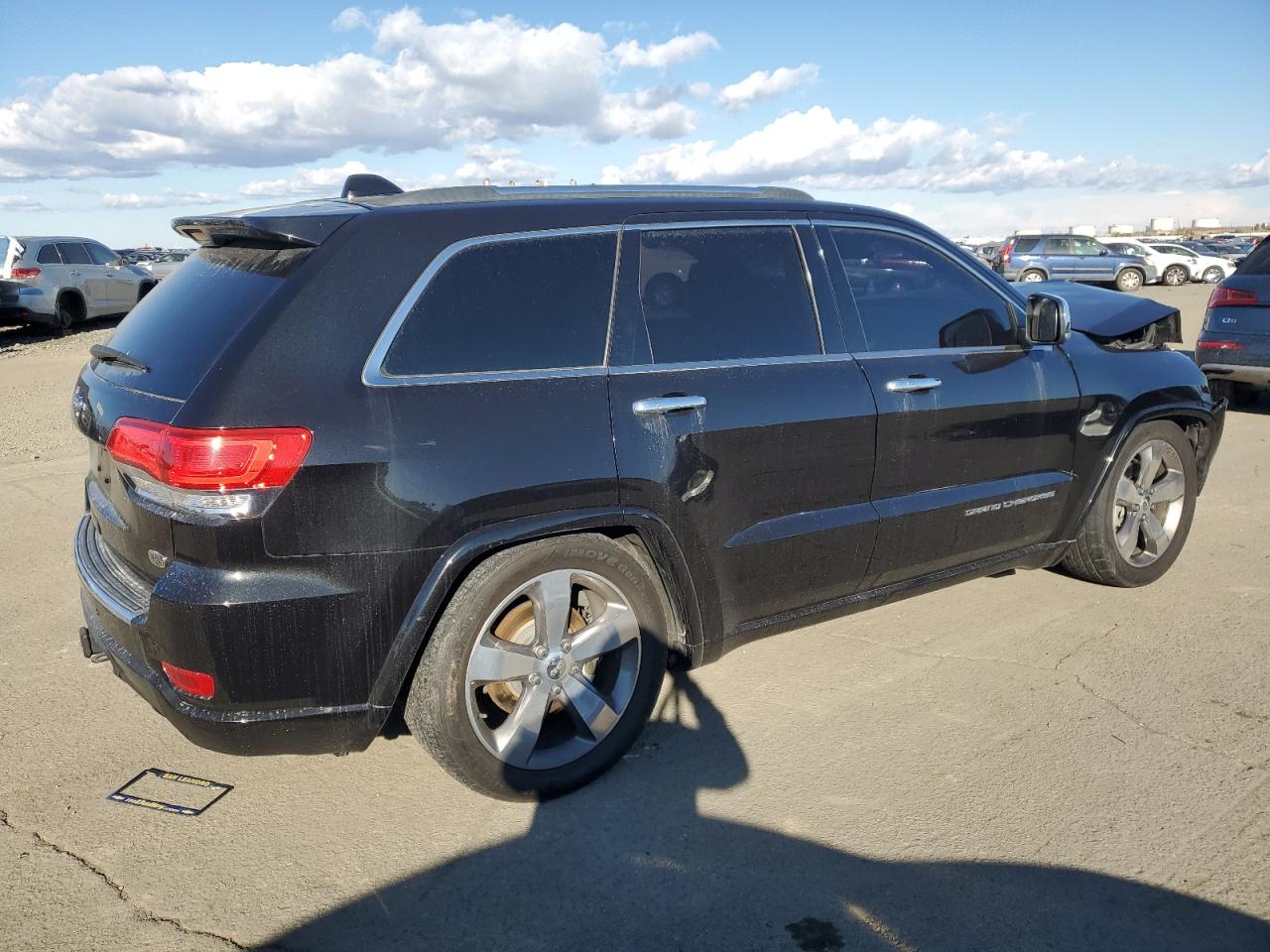 2015 Jeep Grand Cherokee VIN 1C4RJFCG6FC804729 Copart auction photo, front end / side damage thumbnail 3
