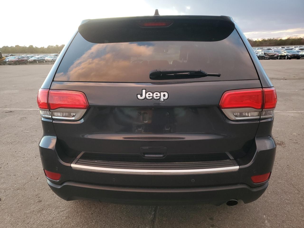 2016 Jeep Grand Cherokee VIN 1C4RJFBG9GC399596 Copart auction photo, front end / side damage thumbnail 6