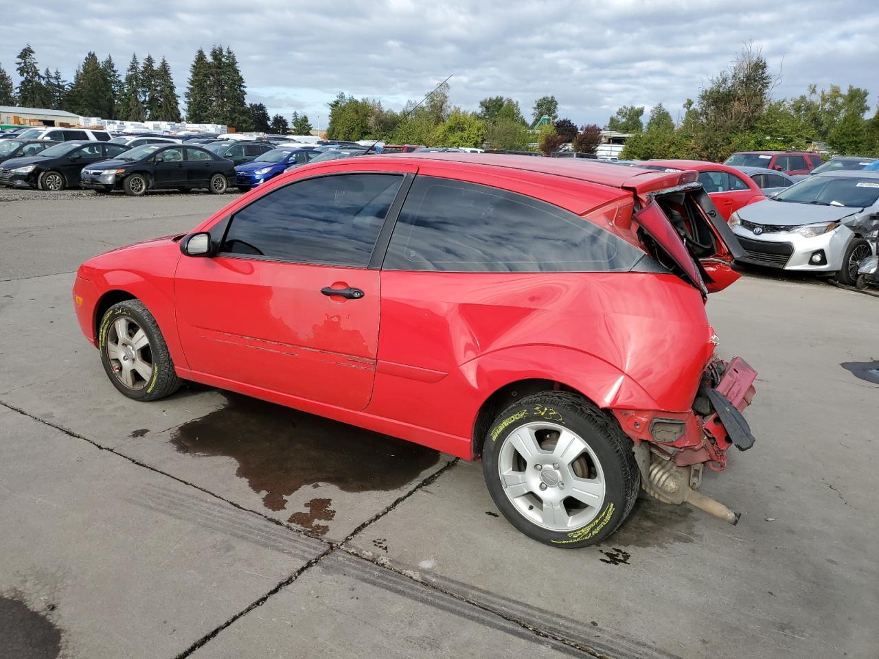 2007 Ford Focus VIN 1FAHP31N07W103717 Copart auction photo, rear end / top/roof damage thumbnail 2