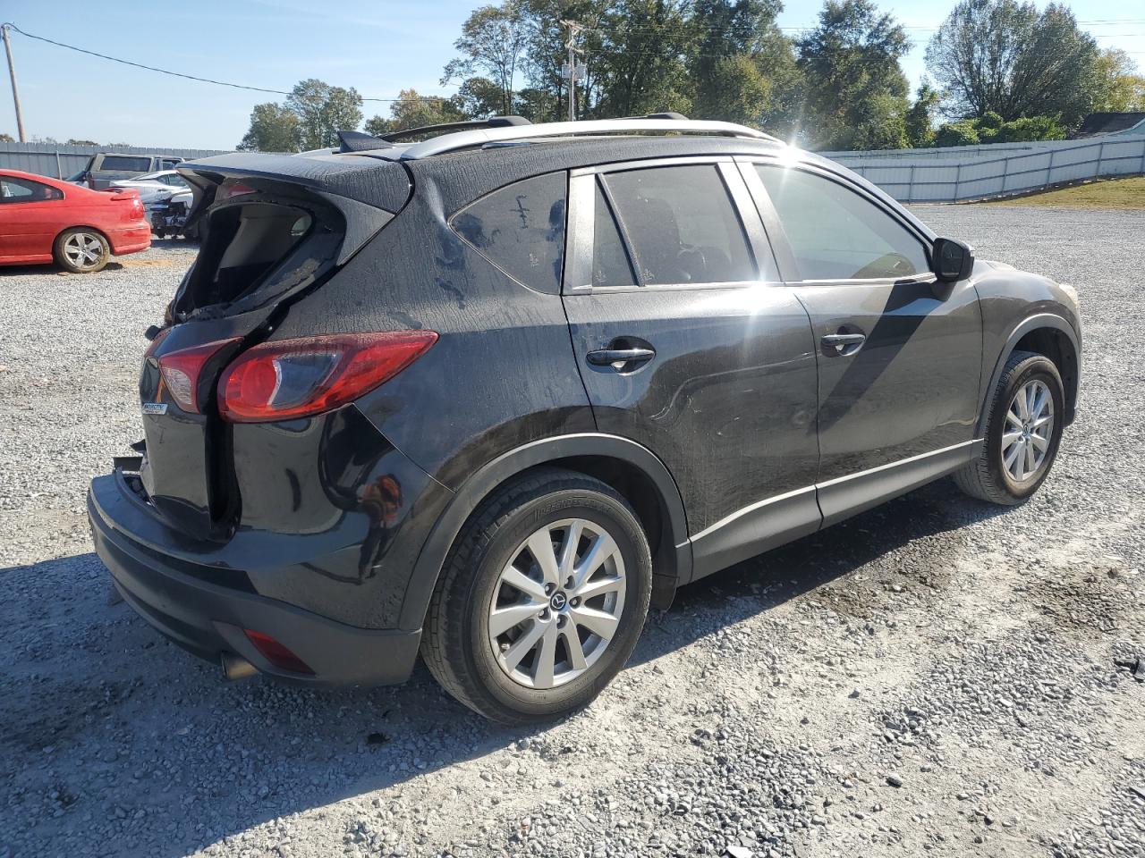 2016 Mazda CX-5 VIN JM3KE4CY2G0893938 Copart auction photo, rear end / side damage thumbnail 3