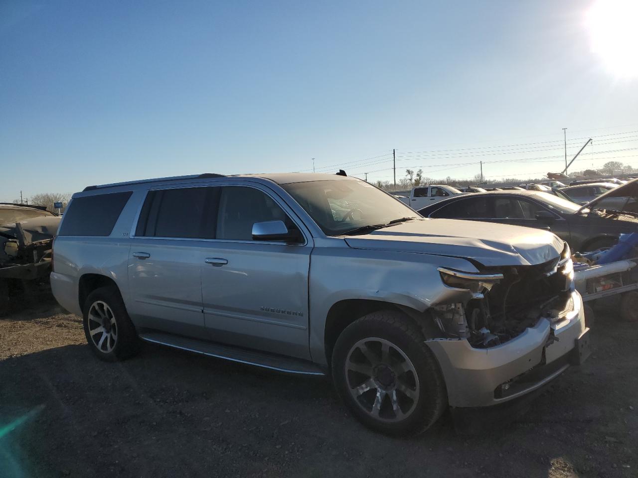 2015 Chevrolet Suburban VIN 1GNSKKKC3FR137399 Copart auction photo, front end damage thumbnail 4