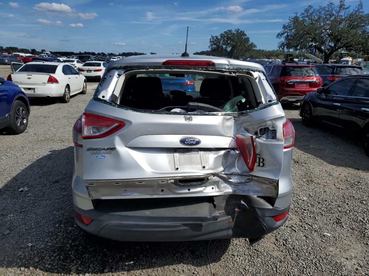 2016 Ford Escape VIN 1FMCU0F76GUC35572 Copart auction photo, rear end damage thumbnail 6