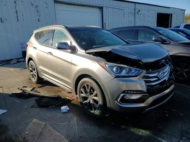 2018 Hyundai Santa Fe VIN 5NMZWDLA5JH055921 Copart auction photo, front end damage thumbnail 14