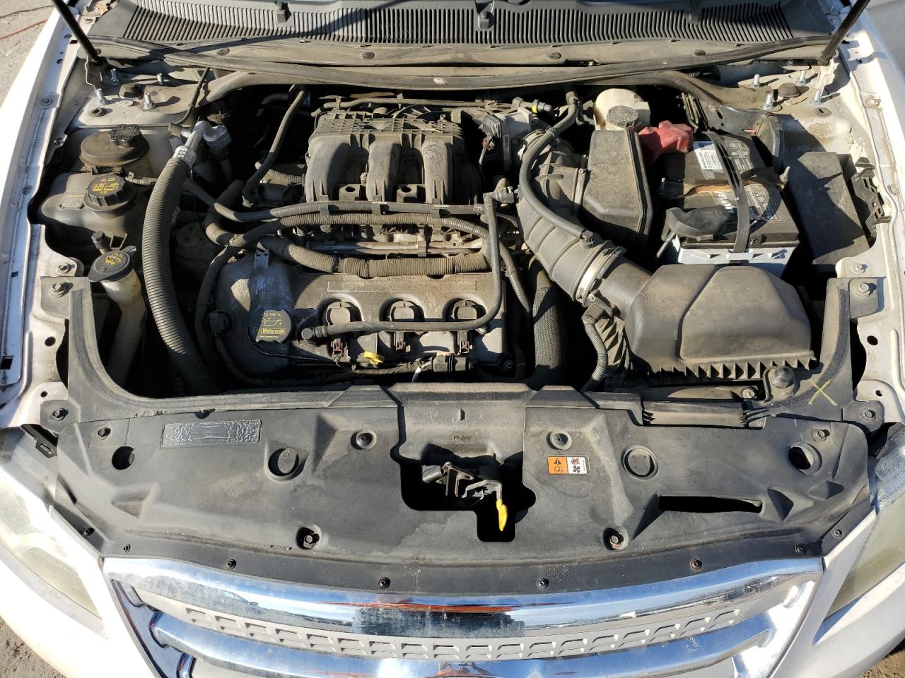 2012 Ford Taurus VIN 1FAHP2FW3CG113786 Copart auction photo, undercarriage / all over damage thumbnail 11