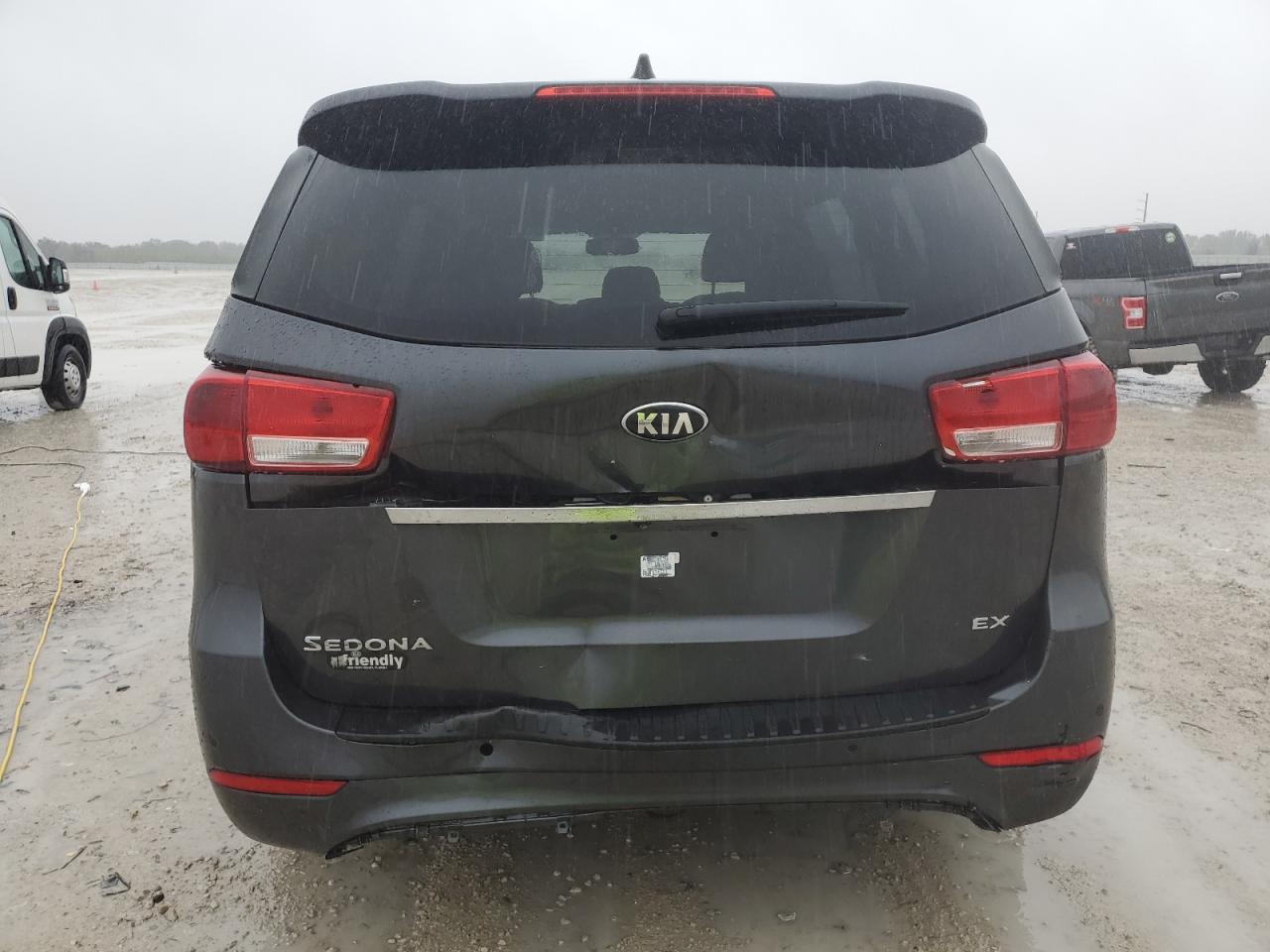 2016 KIA Sedona VIN KNDMC5C10G6173681 Copart auction photo, rear end damage thumbnail 6