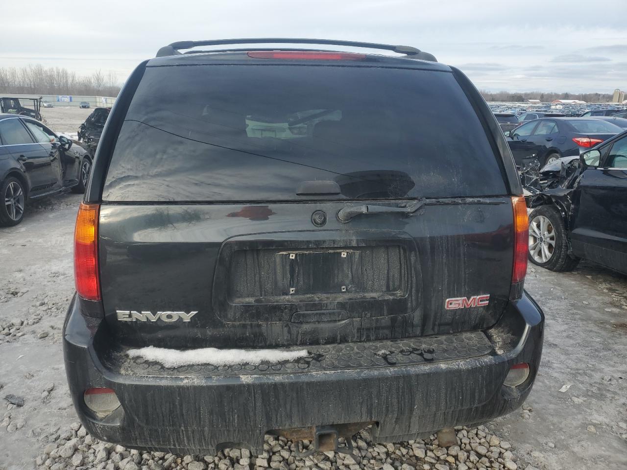 2005 GMC Envoy VIN 1GKET63M652353972 Copart auction photo, rollover damage thumbnail 6