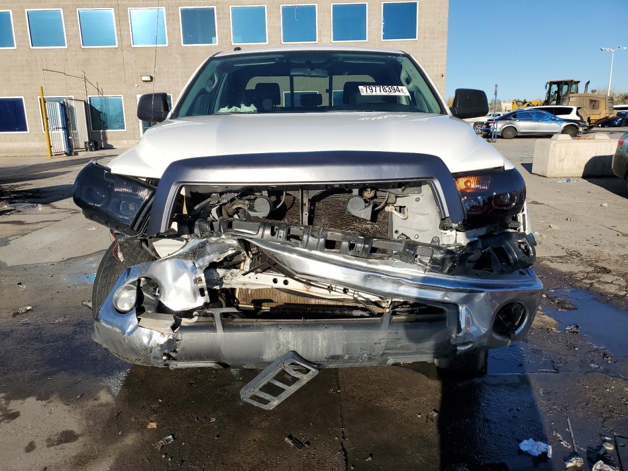 2012 Toyota Tundra VIN 5TFUY5F1XCX230616 Copart auction photo, front end / side damage thumbnail 5