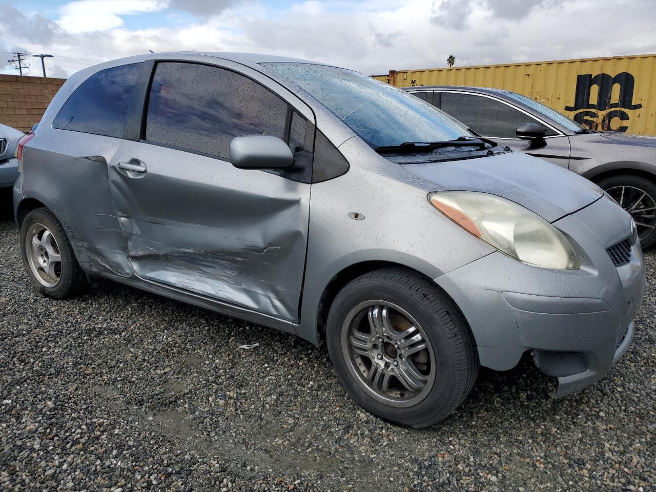2010 Toyota Yaris VIN JTDJT4K36A5297404 Copart auction photo, all over damage thumbnail 4