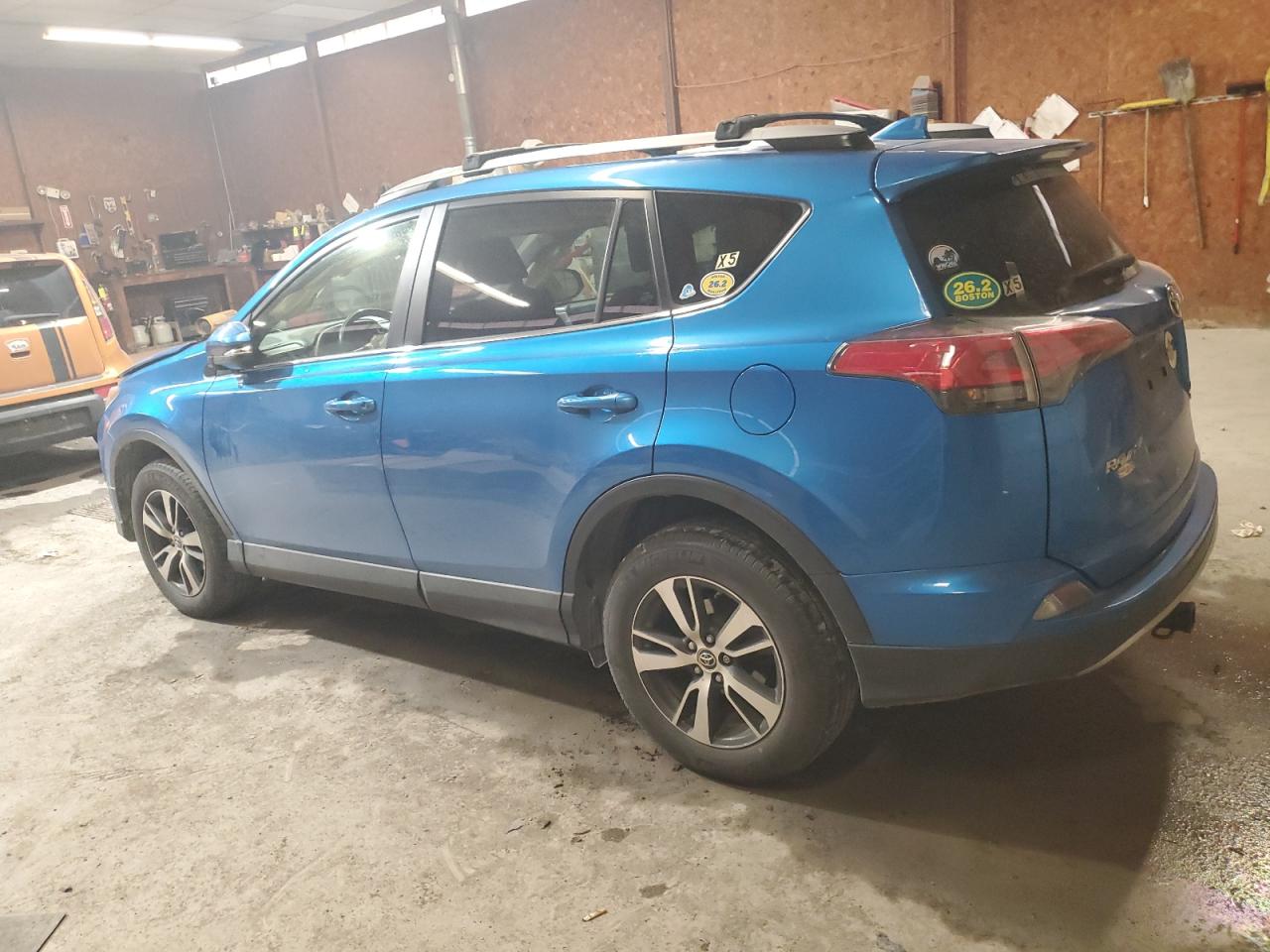 2018 Toyota RAV 4 VIN JTMRFREV3JJ734397 Copart auction photo, front end / side damage thumbnail 2