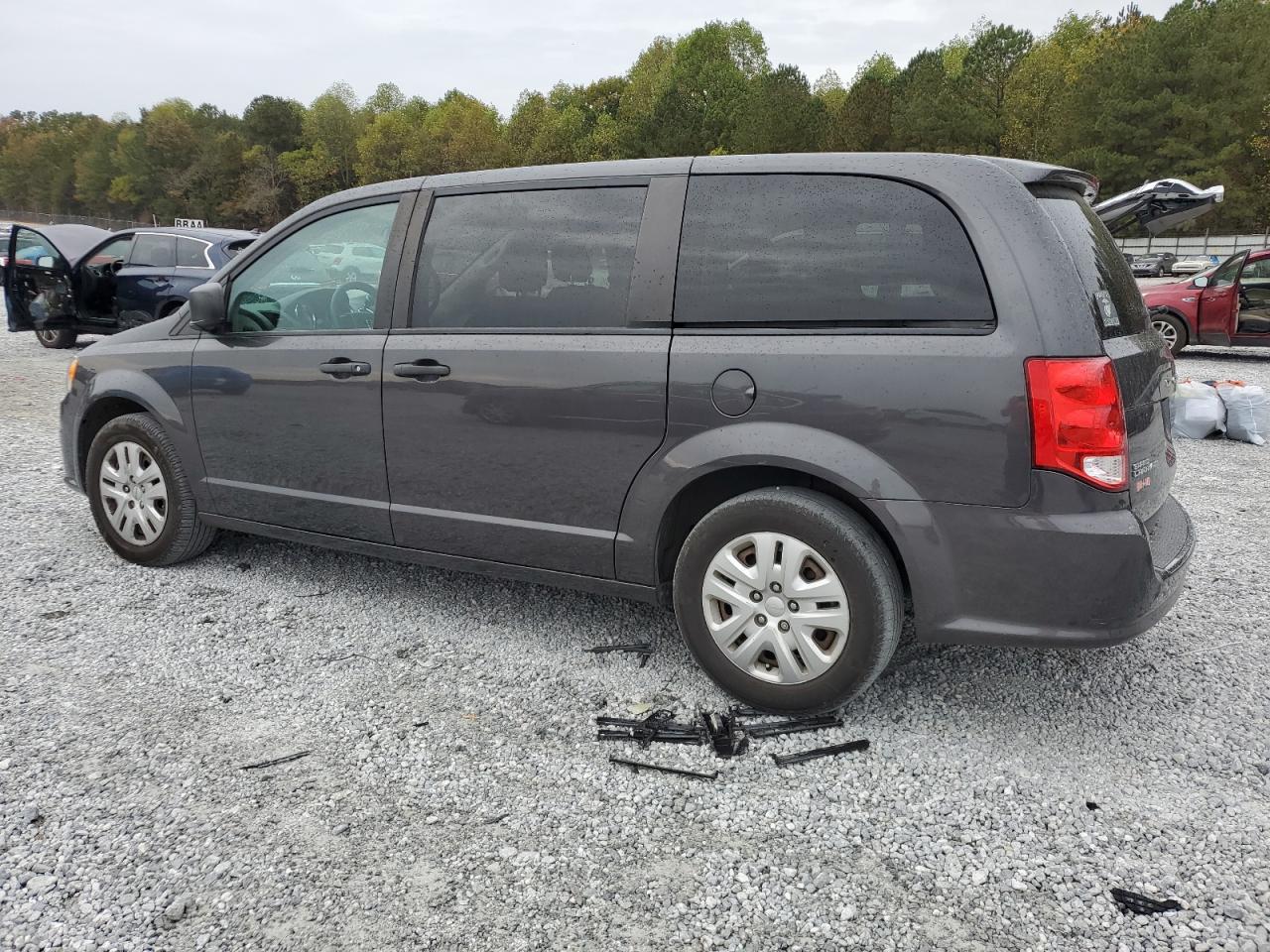 2019 Dodge Caravan VIN 2C4RDGBGXKR547722 Copart auction photo, side / rear end damage thumbnail 2