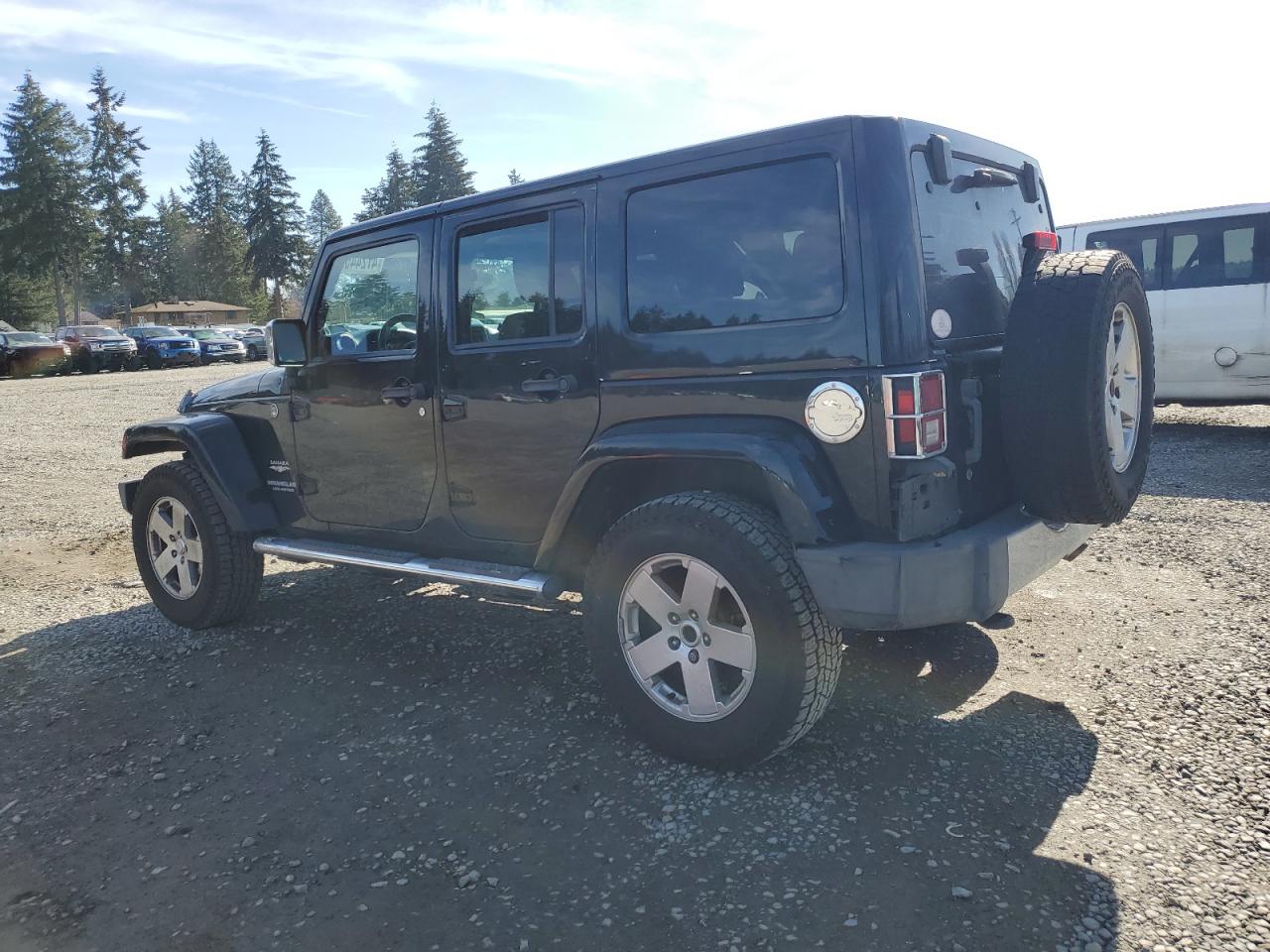 2011 Jeep Wrangler VIN 1J4HA5H19BL581424 Copart auction photo, front end / rear end damage thumbnail 2
