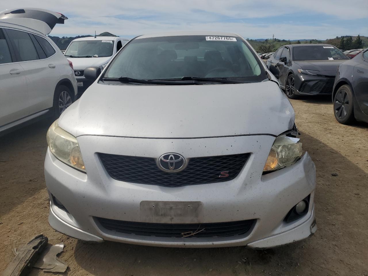 2010 Toyota Corolla VIN 2T1BU4EE5AC467415 Copart auction photo, front end / side damage thumbnail 5