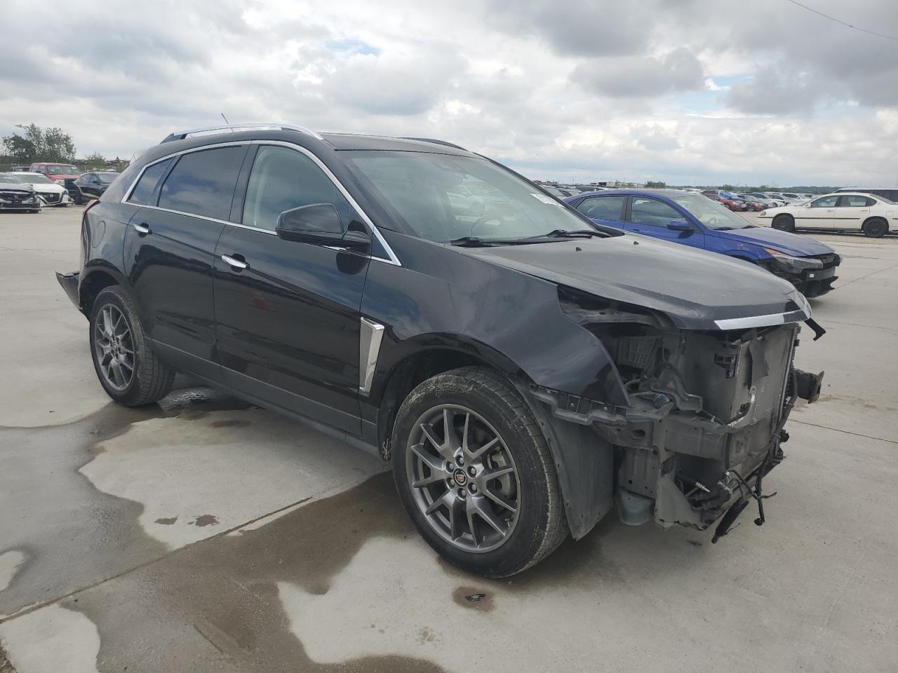 2016 Cadillac SRX VIN 3GYFNDE34GS569520 Copart auction photo, front end damage thumbnail 4