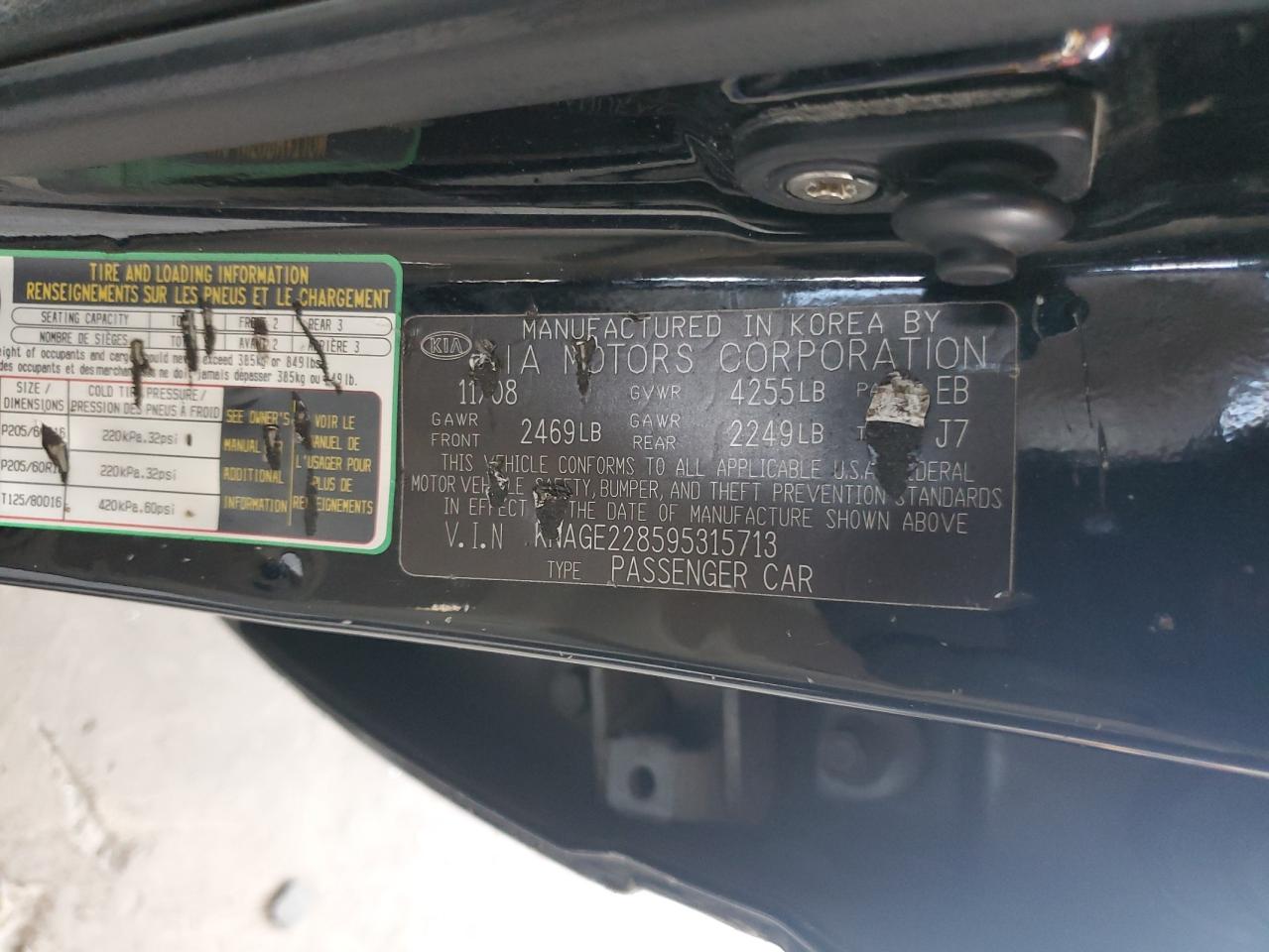 2009 KIA Optima VIN KNAGE228595315713 Copart auction photo, side / front end damage thumbnail 14