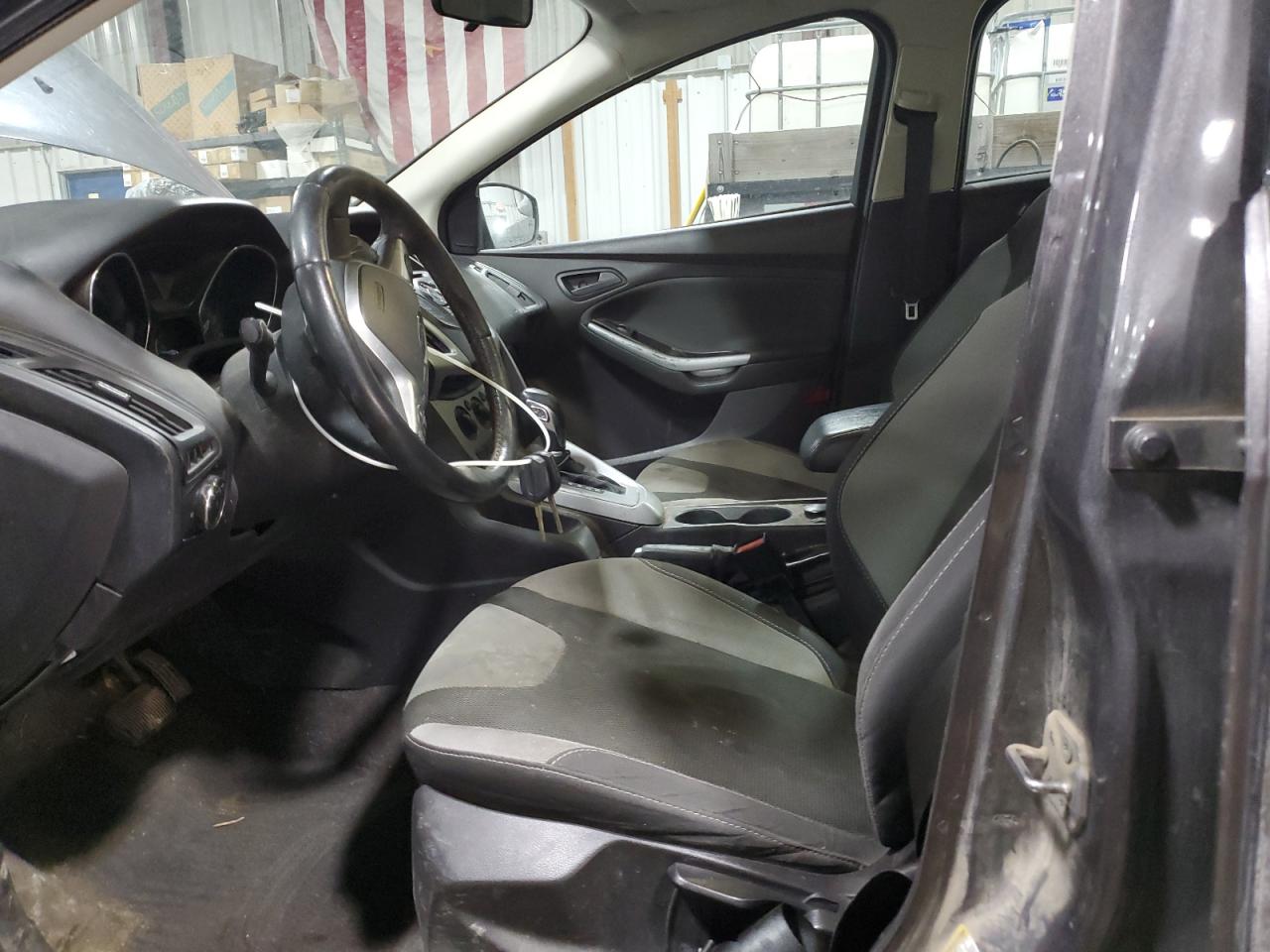 2012 Ford Focus VIN 1FAHP3K2XCL255276 Copart auction photo, front end / side damage thumbnail 7