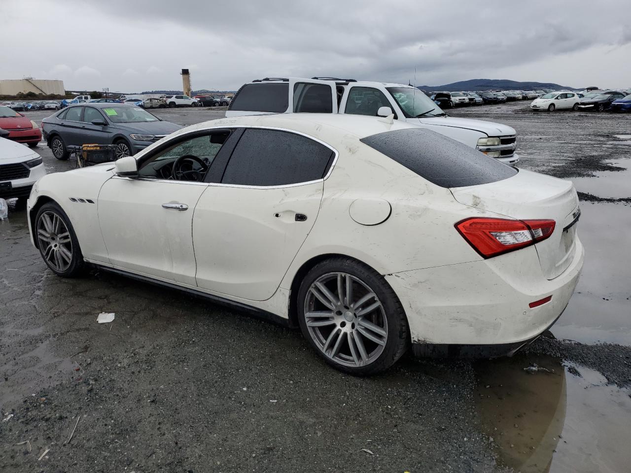 2015 Maserati Ghibli VIN ZAM57XSA2F1133714 Copart auction photo, all over damage thumbnail 2