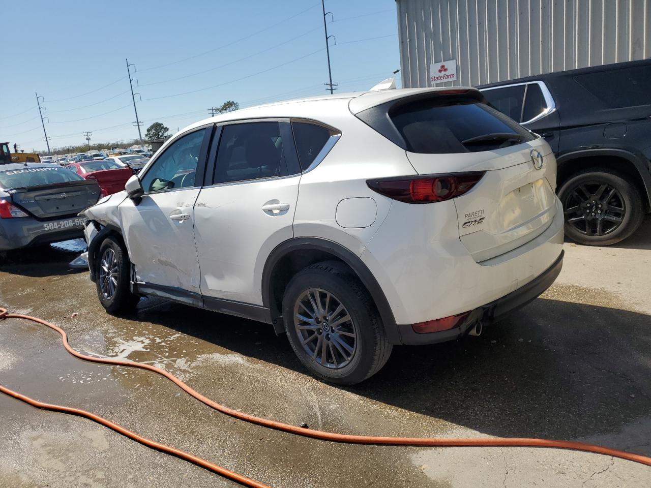 2019 Mazda CX-5 VIN JM3KFACM8K0664374 Copart auction photo, side / front end damage thumbnail 2