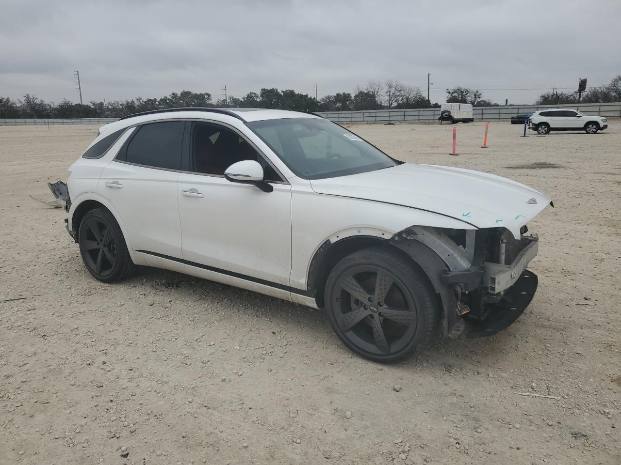 2022 Genesis Gv70 VIN KMUMADTBXNU050274 Copart auction photo, front end / rear end damage thumbnail 4