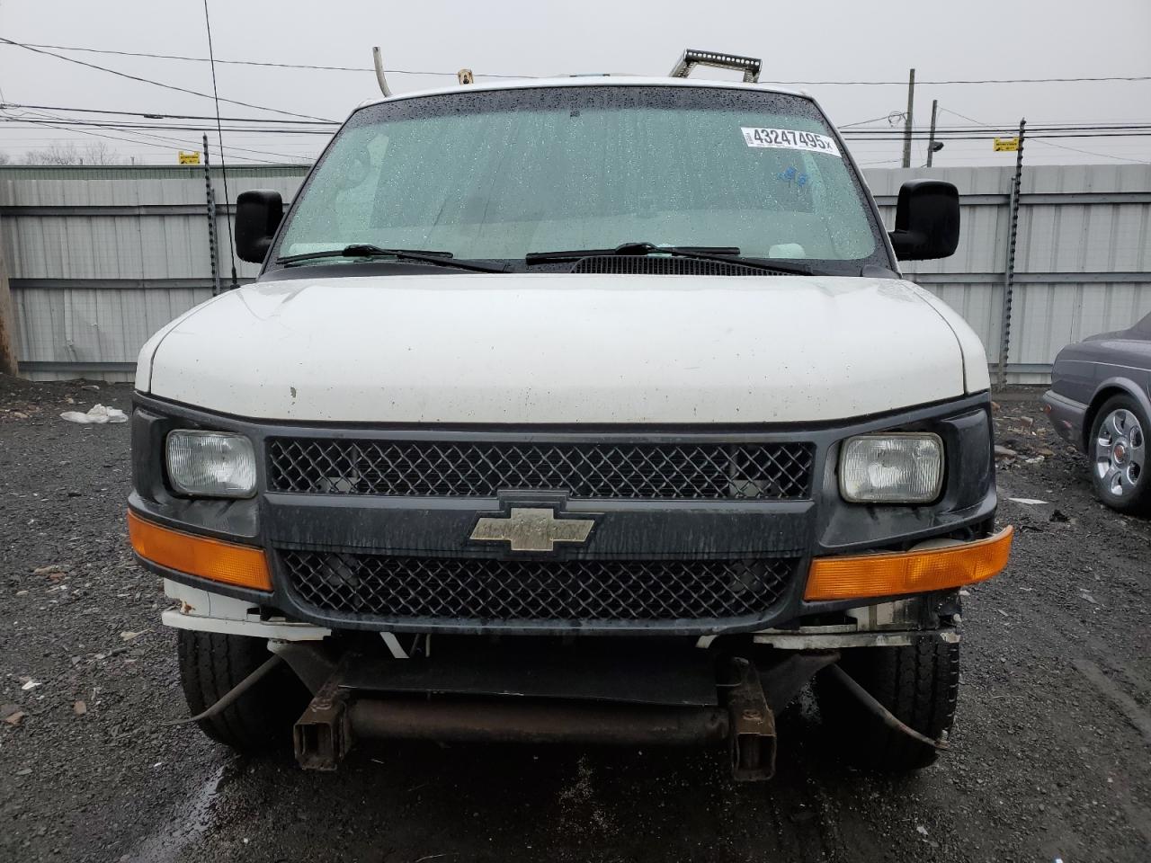2009 Chevrolet Express VIN 1GCGG25C791117963 Copart auction photo, front end / minor dent/scratches damage thumbnail 5