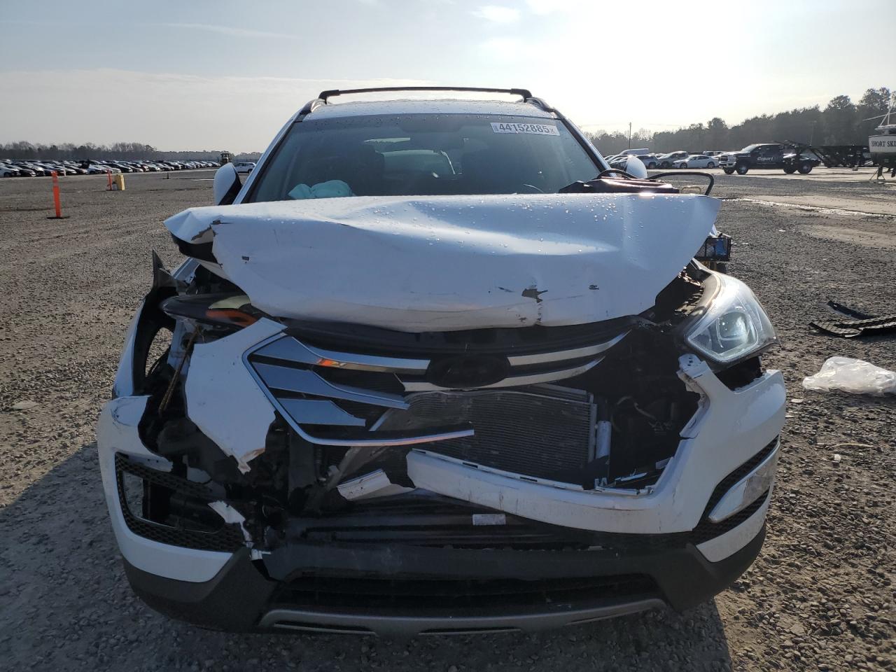 2016 Hyundai Santa Fe VIN 5XYZU3LB4GG365375 Copart auction photo, front end / rear end damage thumbnail 5