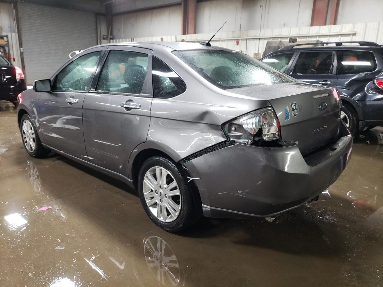 2010 Ford Focus VIN 1FAHP3HN0AW288896 Copart auction photo, rear end damage thumbnail 2
