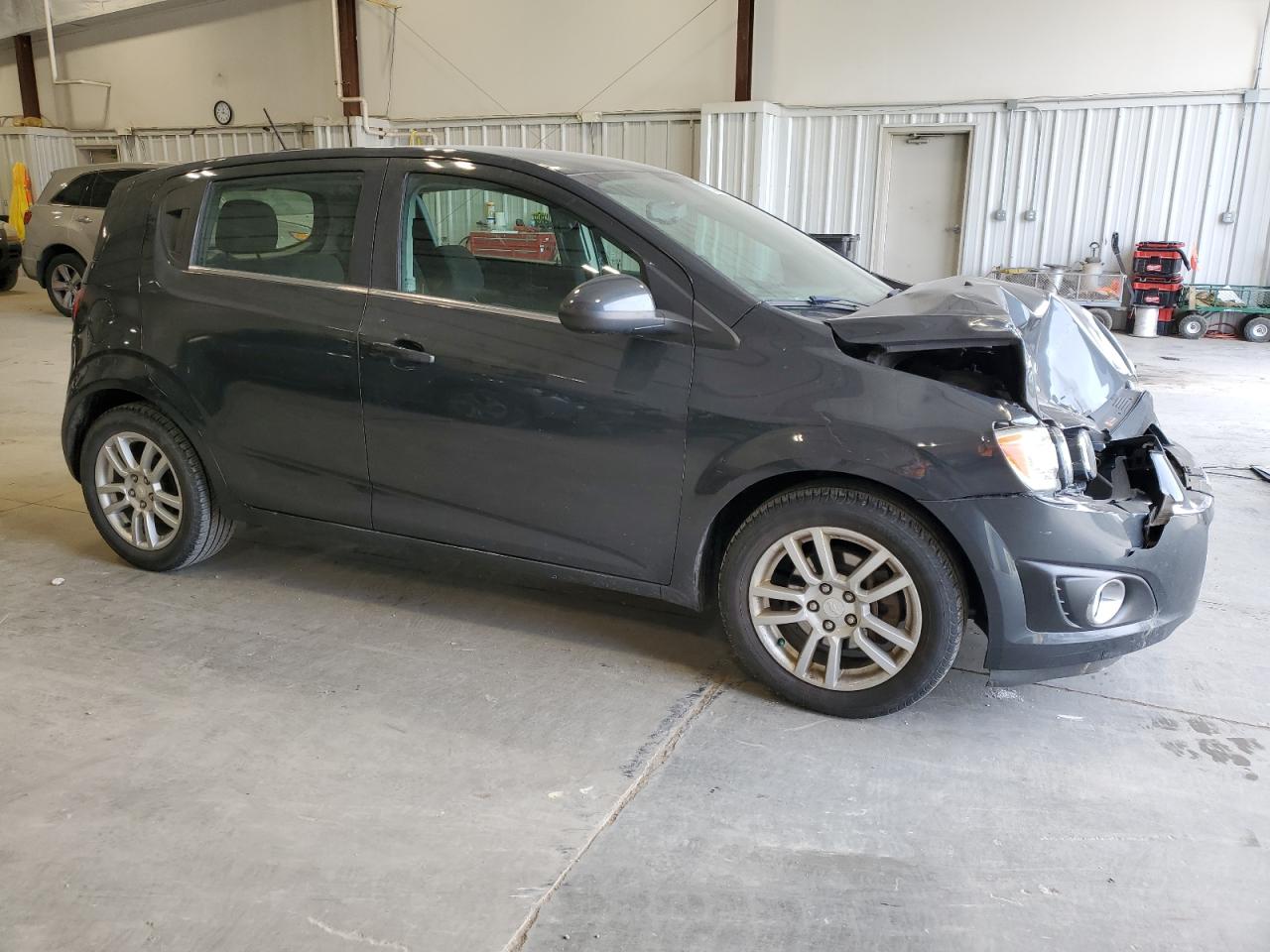 2015 Chevrolet Sonic VIN 1G1JC6SH3F4181672 Copart auction photo, front end damage thumbnail 4
