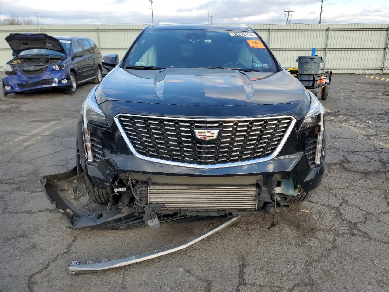 2021 Cadillac XT4 VIN 1GYFZDR4XMF016846 Copart auction photo, side / front end damage thumbnail 5
