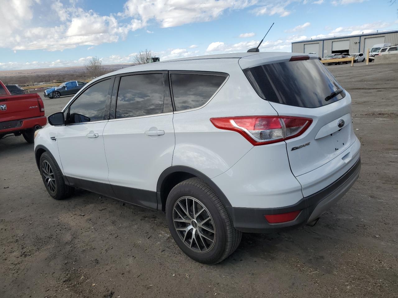 2015 Ford Escape VIN 1FMCU9GX9FUB64160 Copart auction photo, minor dent/scratches / normal wear damage thumbnail 2