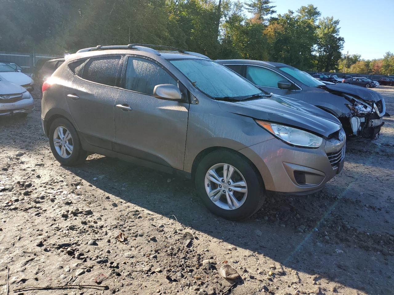 2010 Hyundai Tucson VIN KM8JUCAC3AU075154 Copart auction photo, front end / minor dent/scratches damage thumbnail 4