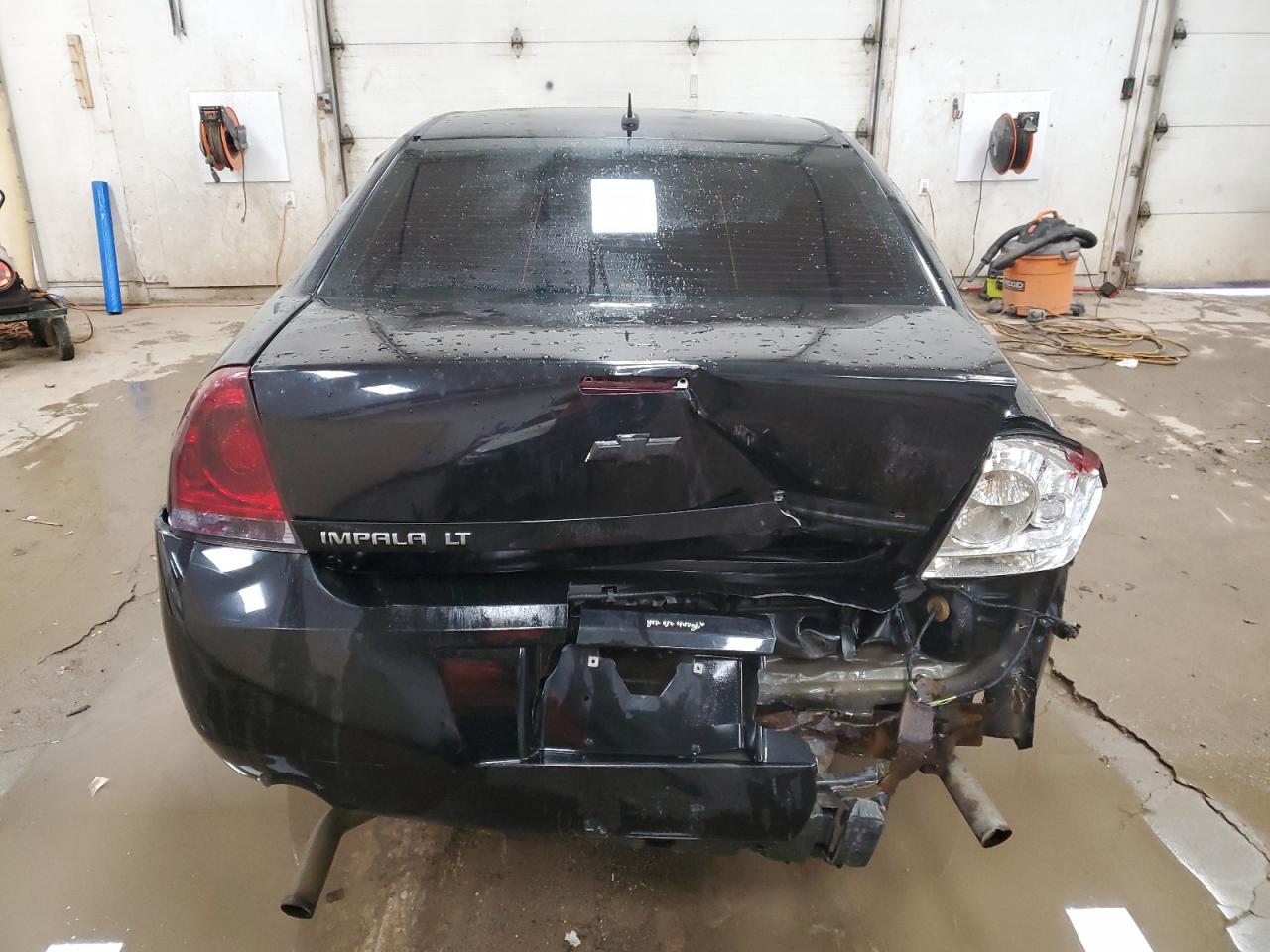 2014 Chevrolet Impala VIN 2G1WB5E36E1105831 Copart auction photo, all over damage thumbnail 6